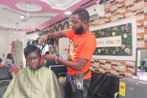 Gendered jobs decline: Eric Niiquaye Nartey, a male hairdresser